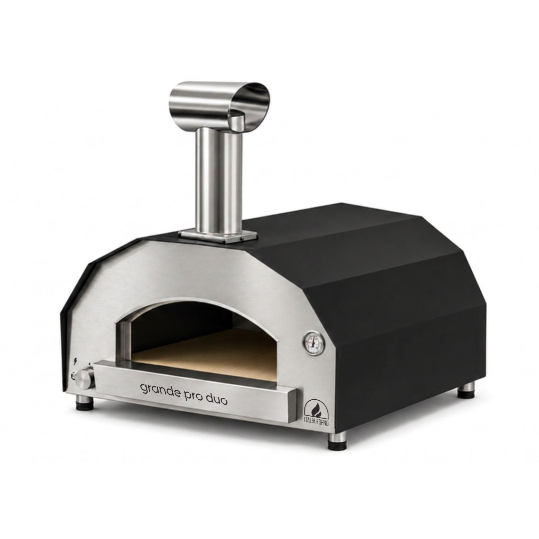 A large Gas & Wood Hybrid pizza oven with a matte black exterior and brushed stainless steel front door and chimney pipe, shown on a plain white background - ItaliaForno Grande Pro Duo Hybrid