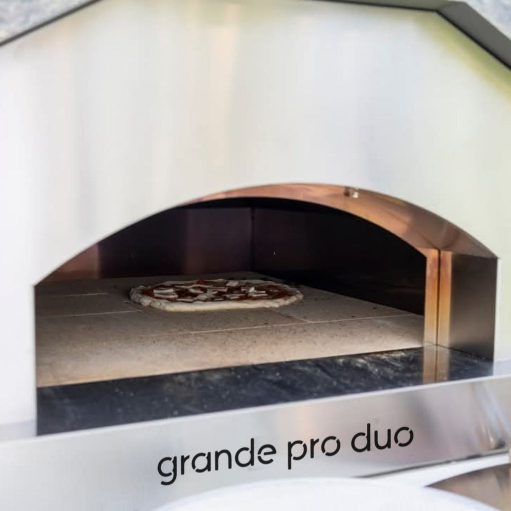 Cooking a pizza inside the hybrid gas and wood pizza oven from Italia | Grande Pro Duo ItaliaForno